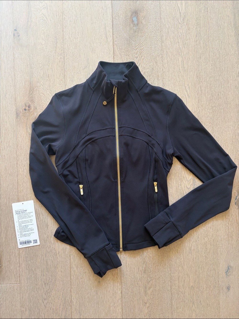 EUC define cropped jacket size 6 black/gold lululemon